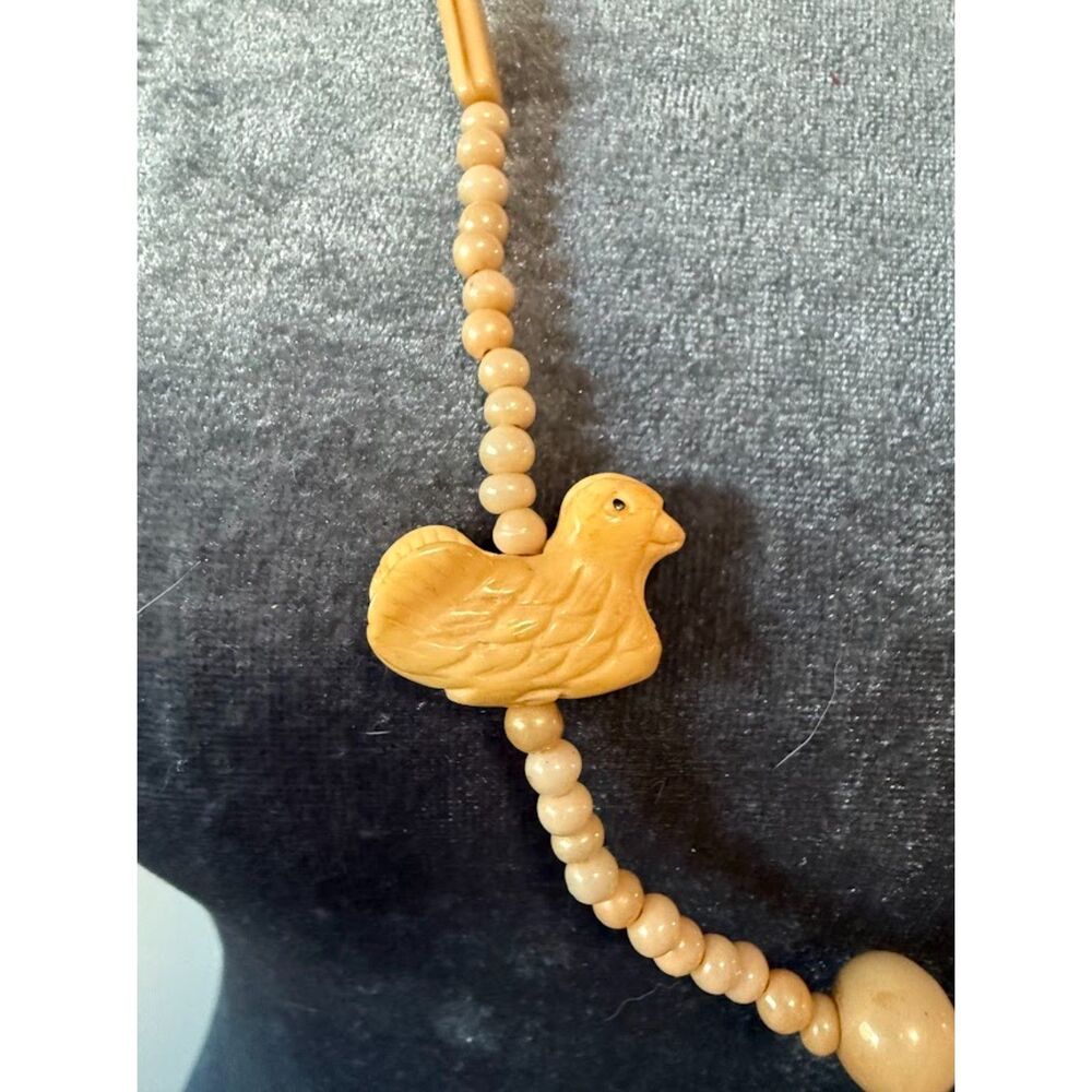 vintage necklace featuring  wooden carved animal-shaped pendants and beads - Picture 2 of 6